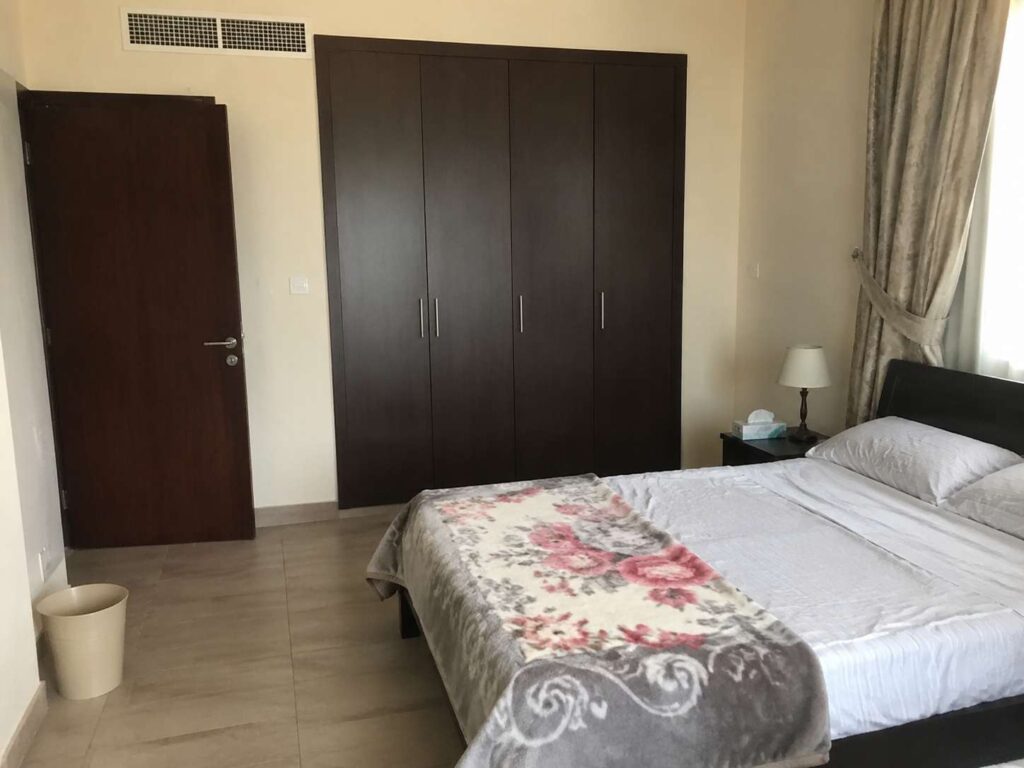 A bedroom in a UAE home with a closed cabinet