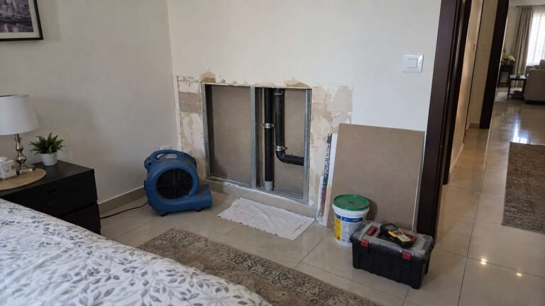 Drying and unfinished wall restoration after mold removal in a UAE home