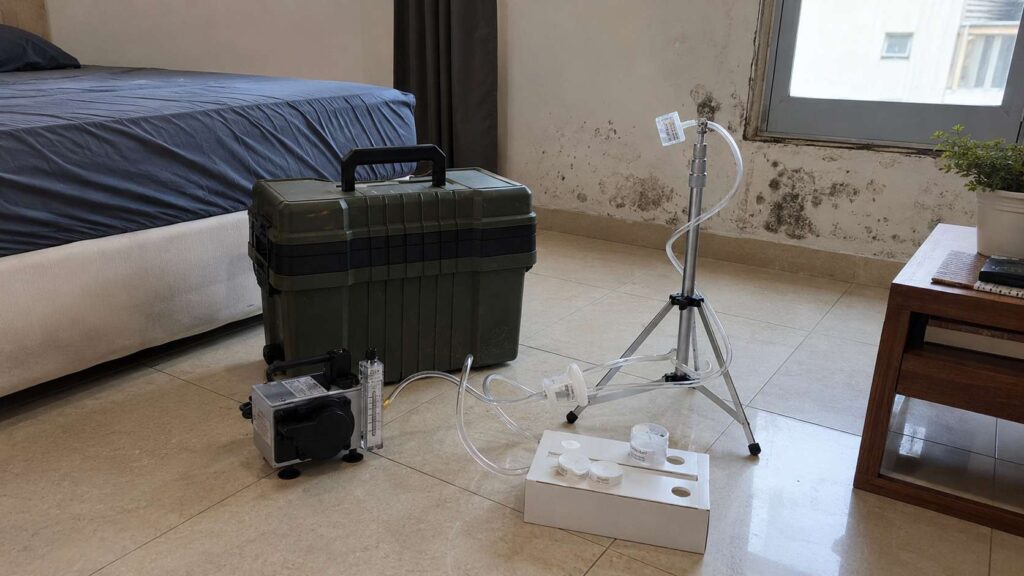 Mold testing kit in a moldy apartment